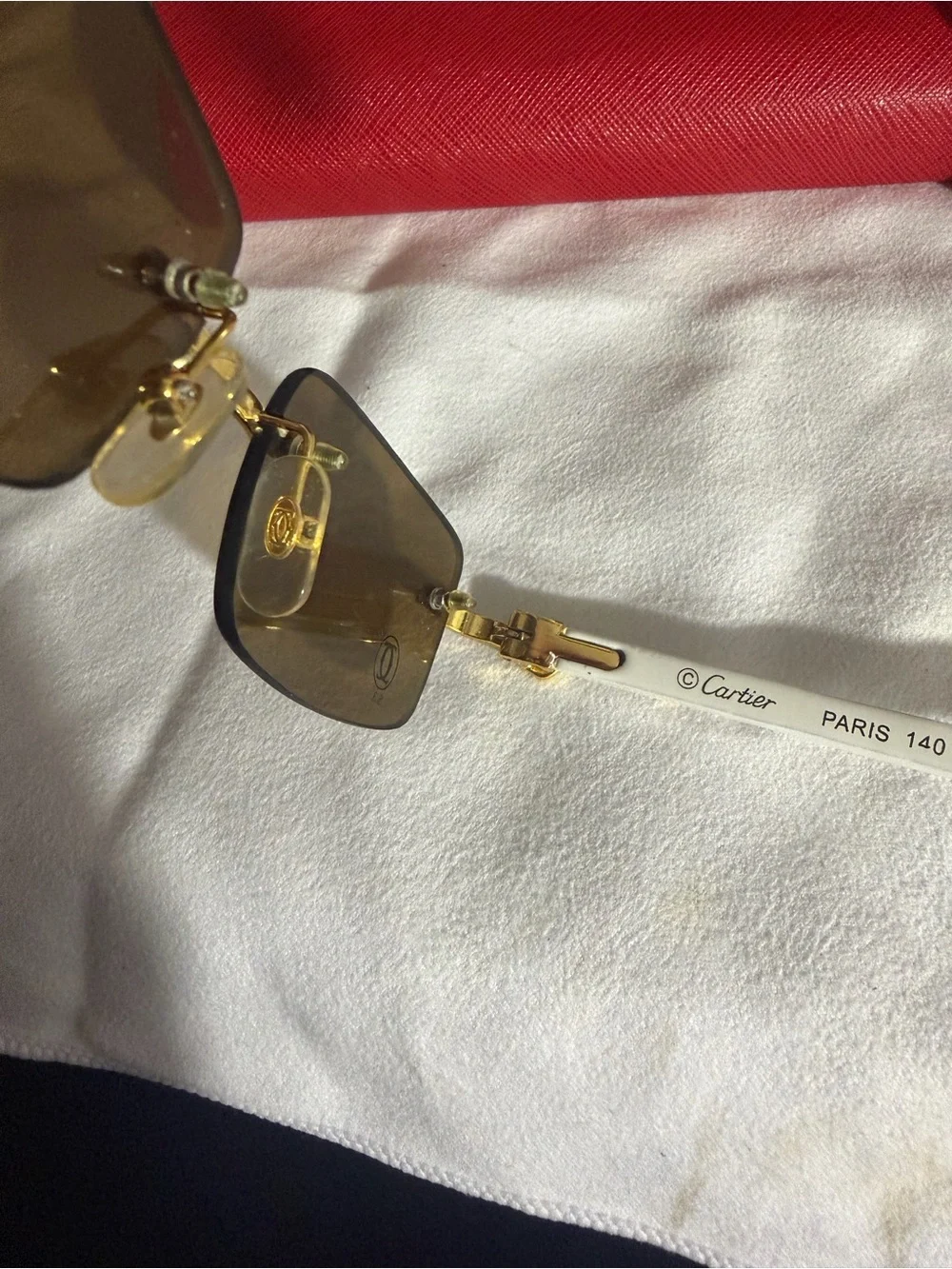 Cartier Rimless Sunglasses with Gold Frame and Brown Lenses